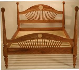 This full size bed is Vermont Black Cherry and Quilted Maple. Every available flat surface has been hand carved